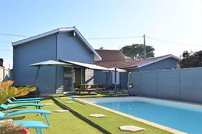 Poolside Escape by Arcachon
