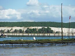 Poolside Escape by Arcachon