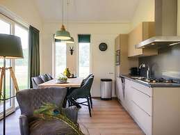 Attractive Bungalow with Covered Terrace near Veluwe