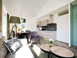 Attractive Bungalow with Covered Terrace near Veluwe