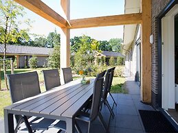 Attractive Bungalow with Covered Terrace near Veluwe