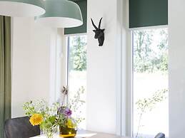 Attractive Bungalow with Covered Terrace near Veluwe