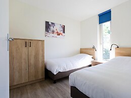 Attractive Bungalow with Covered Terrace near Veluwe