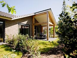 Attractive Bungalow with Covered Terrace near Veluwe