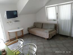 Apartment for 4 Guests Near the Beach in Biograd, Lovely Garden Modern