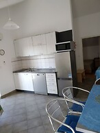 Apartment for 4 Guests Near the Beach in Biograd, Lovely Garden Modern