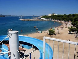 Apartment for 4 Guests Near the Beach in Biograd, Lovely Garden Modern