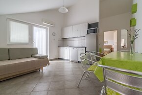 Apartment for 4 Guests Near the Beach in Biograd, Lovely Garden Modern