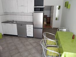 Apartment for 4 Guests Near the Beach in Biograd, Lovely Garden Modern