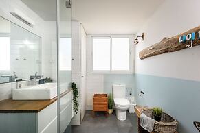 Modern Loft Retreat with Rooftop by Sea N Rent