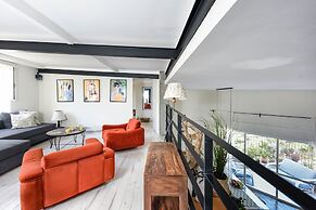 Modern Loft Retreat with Rooftop by Sea N Rent