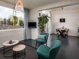 Modern Waterfront Lodge, Located Within Green Surroundings