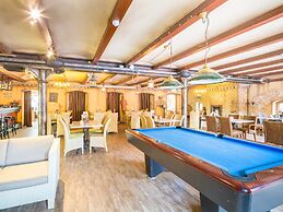 Cosy Bungalow Within De Maasduinen Area