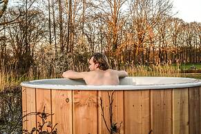 Fine Chalet near Water with Woodfired Hot Tub