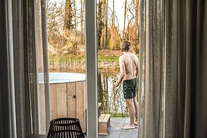 Fine Chalet near Water with Woodfired Hot Tub