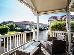 Cozy Chalet Right on the Water in Friesland