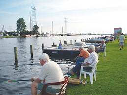 Cozy Chalet Right on the Water in Friesland
