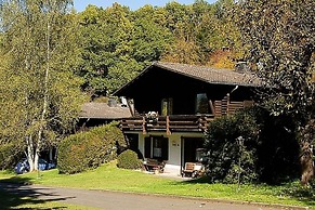 Tidy Chalet With Fireplace, Located in Wooded Area