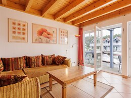 Cozy Holiday Home with Wood Burning Stove near Water