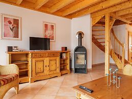 Cozy Holiday Home with Wood Burning Stove near Water