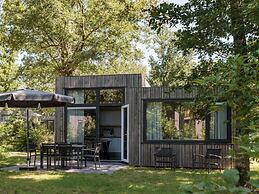 Modern Lodge With two Bathrooms Within Green Surroundings