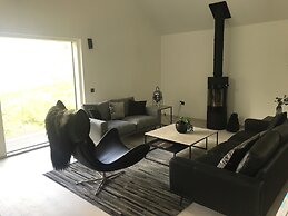 Red Stag With Stunning Loch and Waterfall View