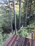 Red Stag With Stunning Loch and Waterfall View