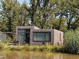 Modern Waterfront Lodge, Located Within Green Surroundings
