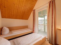 Cozy Holiday Home with Wood Burning Stove near Water