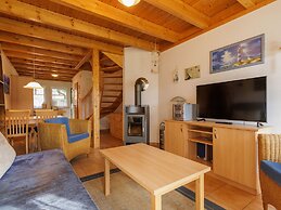 Cozy Holiday Home with Wood Burning Stove near Water