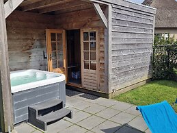 Nice Holiday Home with Sauna & Hot Tub near Wadden Sea