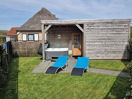 Nice Holiday Home with Sauna & Hot Tub near Wadden Sea
