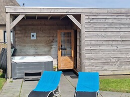 Nice Holiday Home with Sauna & Hot Tub near Wadden Sea