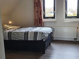 Nice Holiday Home with Sauna & Hot Tub near Wadden Sea