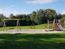 Nice Holiday Home with Sauna & Hot Tub near Wadden Sea