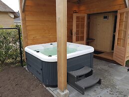 Nice Holiday Home with Sauna & Hot Tub near Wadden Sea