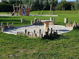 Nice Holiday Home with Sauna & Hot Tub near Wadden Sea