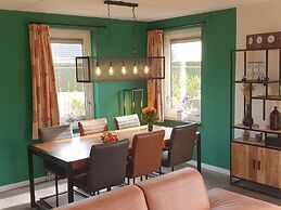 Nice Holiday Home with Sauna & Hot Tub near Wadden Sea