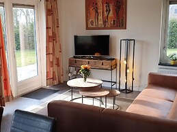 Nice Holiday Home with Sauna & Hot Tub near Wadden Sea