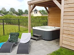 Nice Holiday Home with Sauna & Hot Tub near Wadden Sea