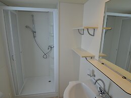 Nice Chalet with Terrace near Sea