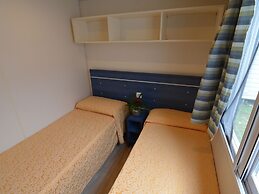 Nice Chalet with Terrace near Sea