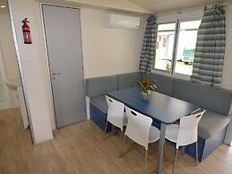 Nice Chalet with Terrace near Sea