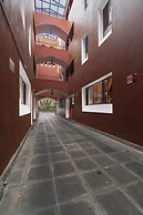 Meson Real Hotel & Suites