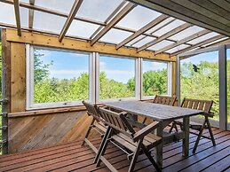 Quaint Holiday Home near Glesborg with Roofed Terrace