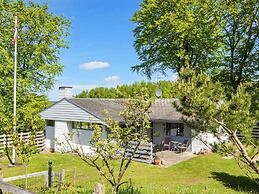 Quaint Holiday Home near Glesborg with Roofed Terrace