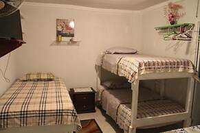 Room in Guest Room - Posada Green Sea in the Harmony Hall Hill Area of