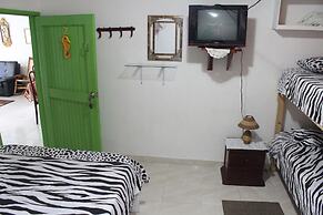 Room in Guest Room - Posada Green Sea in the Harmony Hall Hill Area of