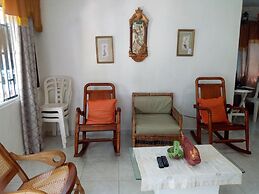 Room in Guest Room - Green Sea Inn in the San Luis Sector