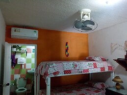 Room in Guest Room - Green Sea Inn in the San Luis Sector